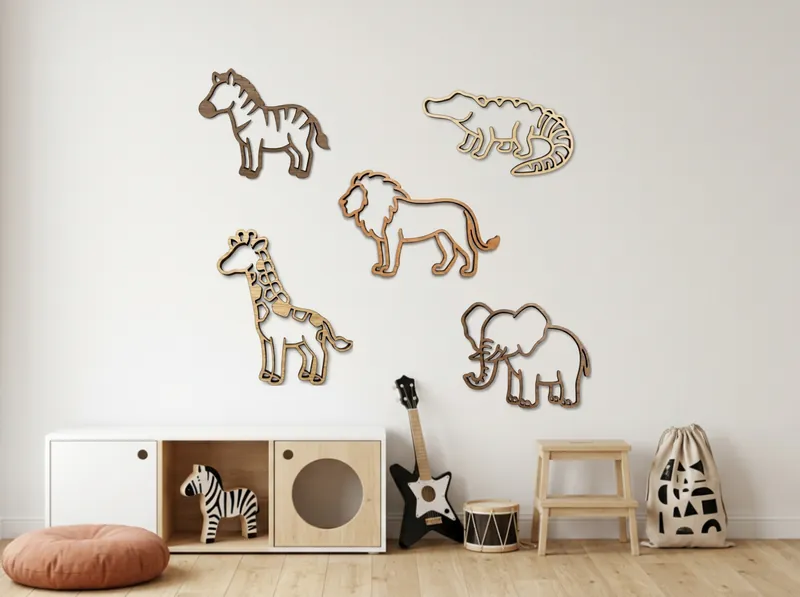 Five wooden safari animals, zebra, crocodile, lion, giraffe and elephant, on a nursery wall